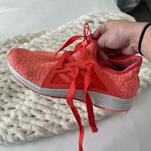 Pink neon athletic shoes, size 8, worn once- still in great condition!